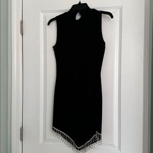 Elegant Black Sleeveless Dress with Beaded Hem